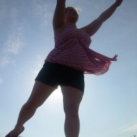 Woman standing in the light
